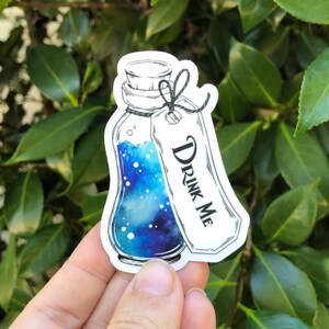 Drink Me Galaxy Vinyl Sticker: Waterproof Laptop Decal