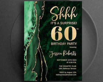 May include: Emerald green 60th birthday party invitation with gold text and accents. The invitation reads "Shhh It's a Surprise!" and includes the honoree's name, date, time, and location. The background has a marble effect.
