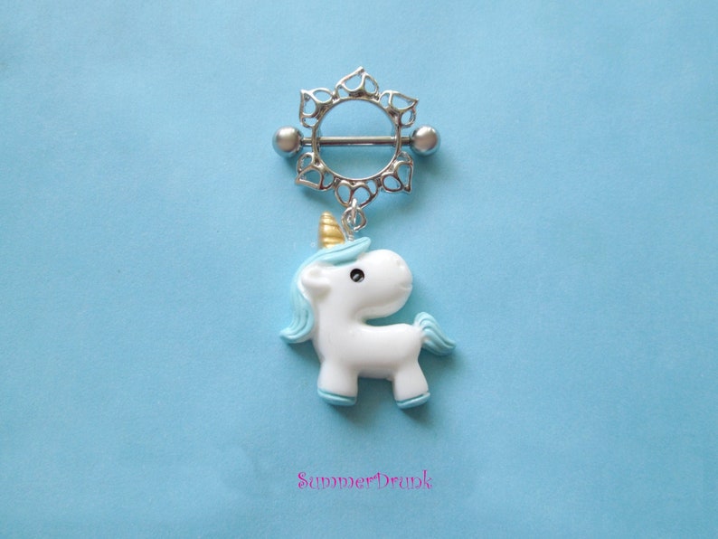 Unicorn nipple ring.