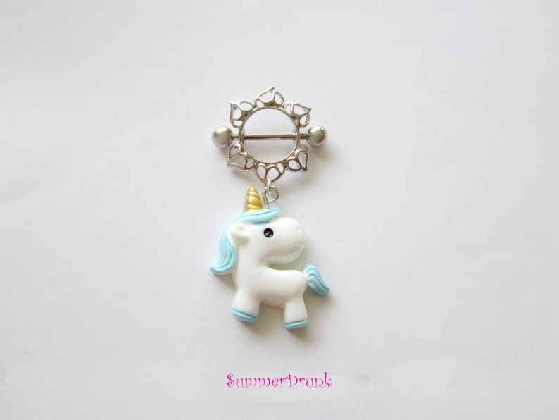 Unicorn nipple ring.