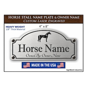 May include: A silver-colored metal horse stall name plate measuring 4 inches by 8 inches and 1/8 inch thick. The plate features a laser-engraved horse silhouette, the text Horse Name, and Owned By: Owner Name, secured by four corner screws.