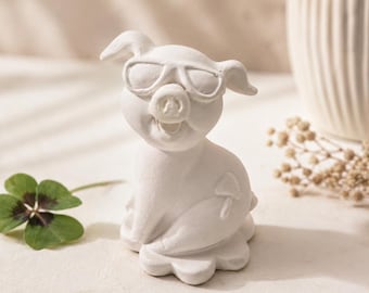 Gießform aus Latex – Schwein mit Brille auf Kleeblatt
