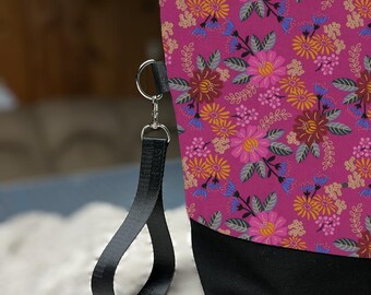 Medium sized knitting bag in pink floral print for light sweaters, shawls or other multi-skein projects