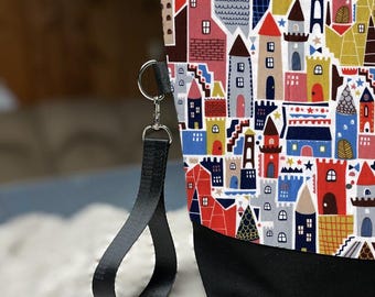 Medium sized knitting bag in buildings print for light sweaters, shawls or other multi-skein projects