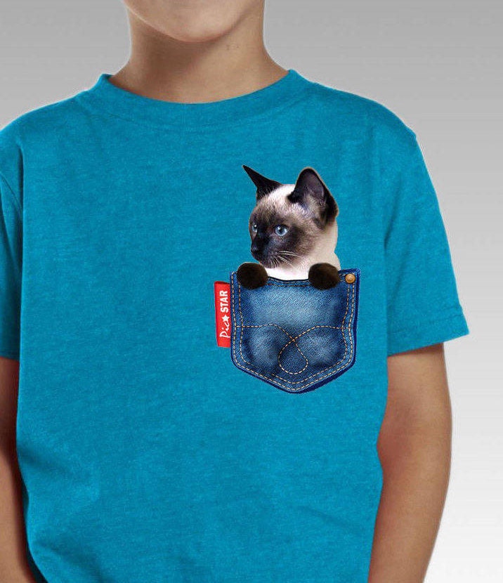 Pet siamese Cat in a Jean Pocket T 