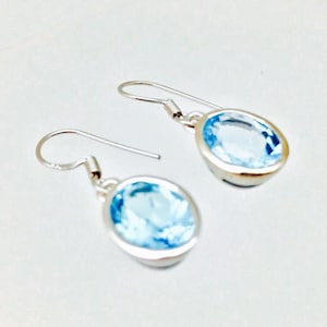 Blue Topaz Earrings // 925 Sterling Silver // Non Tarnishing Rhodium Finish // Simple Oval Setting // Hook Wires