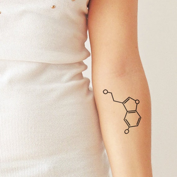 Minimalist tattoo of serotonin formula on Craiyon