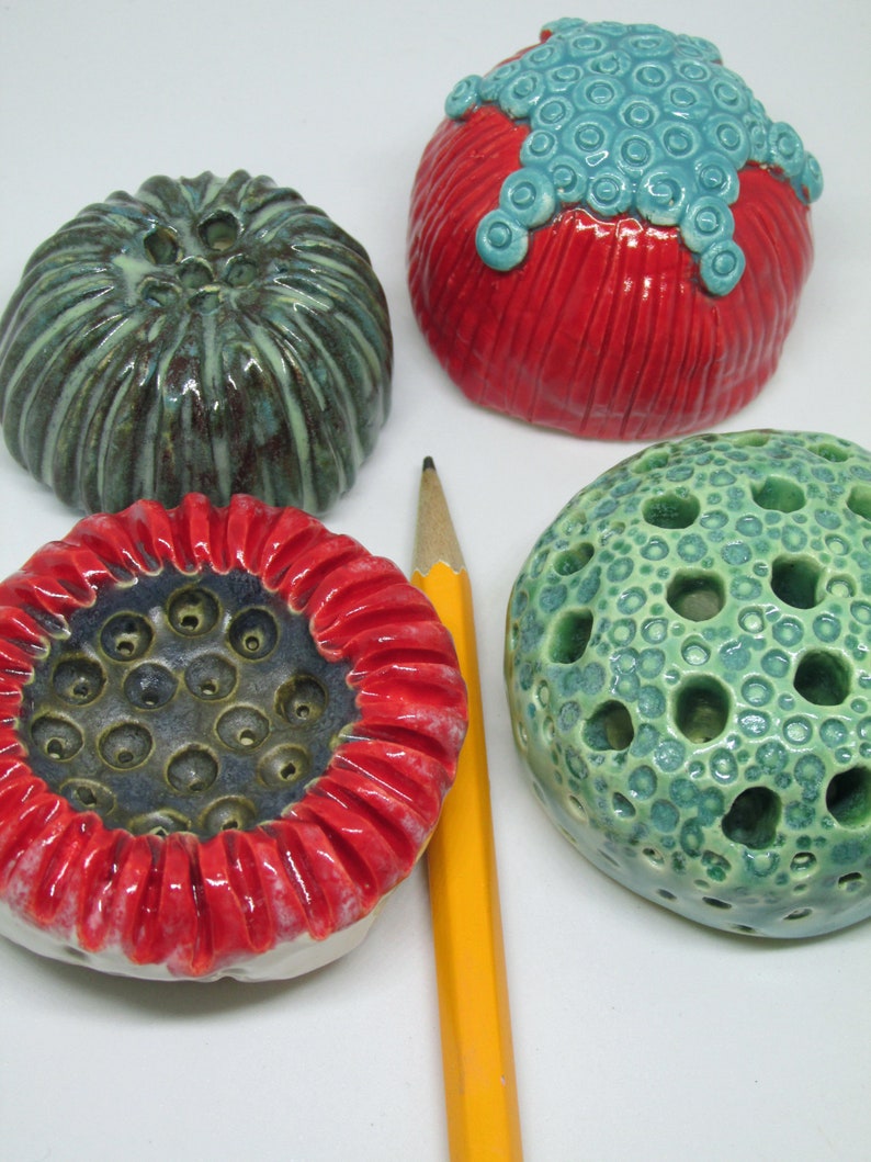 Ceramic fired organic wall piece or paperweight textured I call blueberry and cherries
