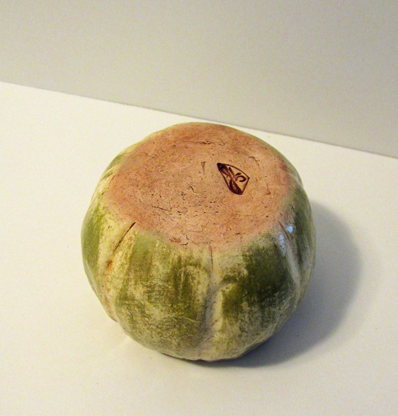 Small ceramic fired pumpkin style trinket bowl