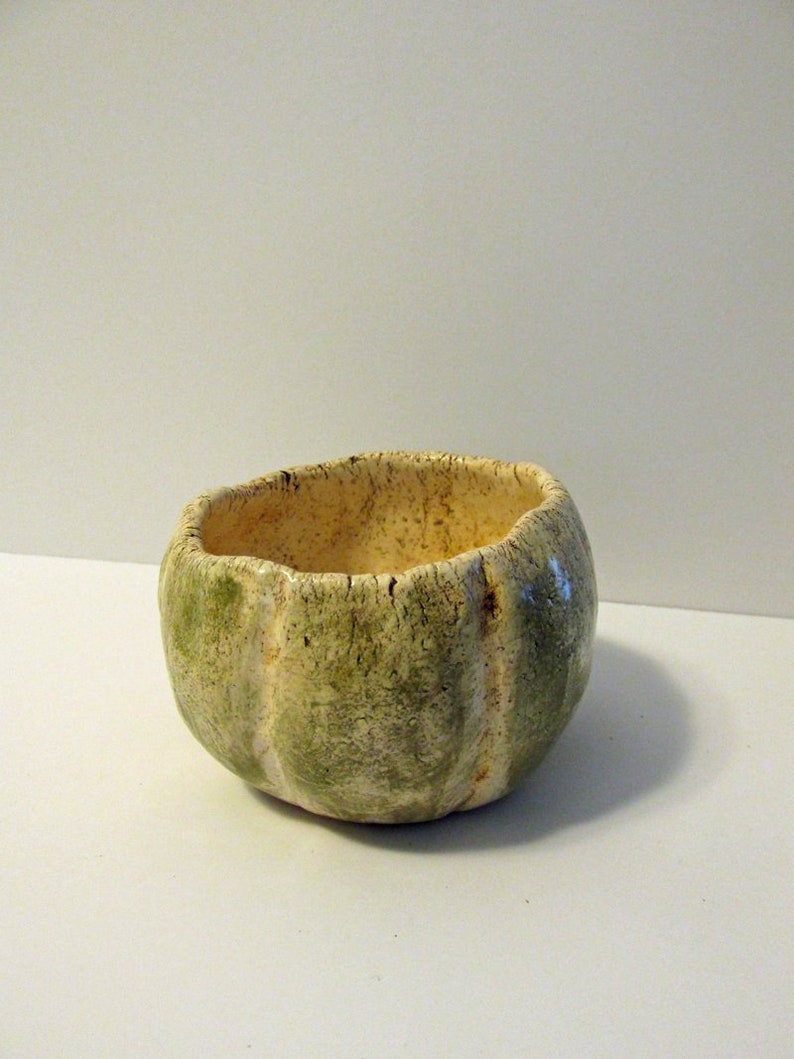 Small ceramic fired pumpkin style trinket bowl