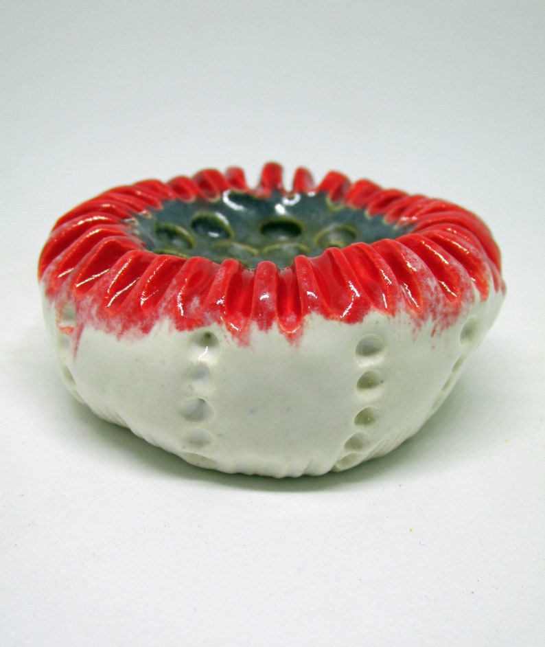 Ceramic fired organic wall piece or paperweight textured I call blueberry and cherries