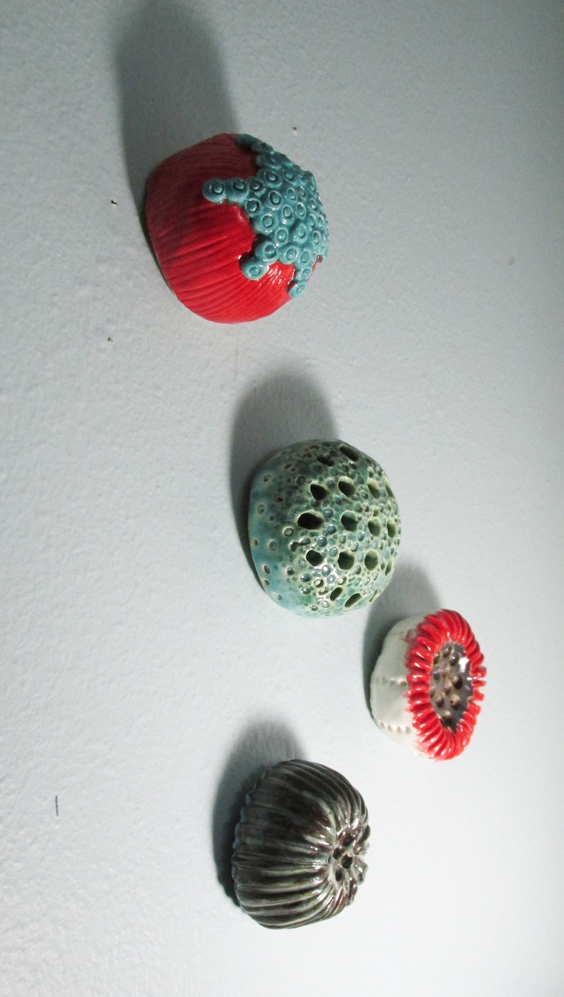 Ceramic fired organic wall piece or paperweight textured I call blueberry and cherries