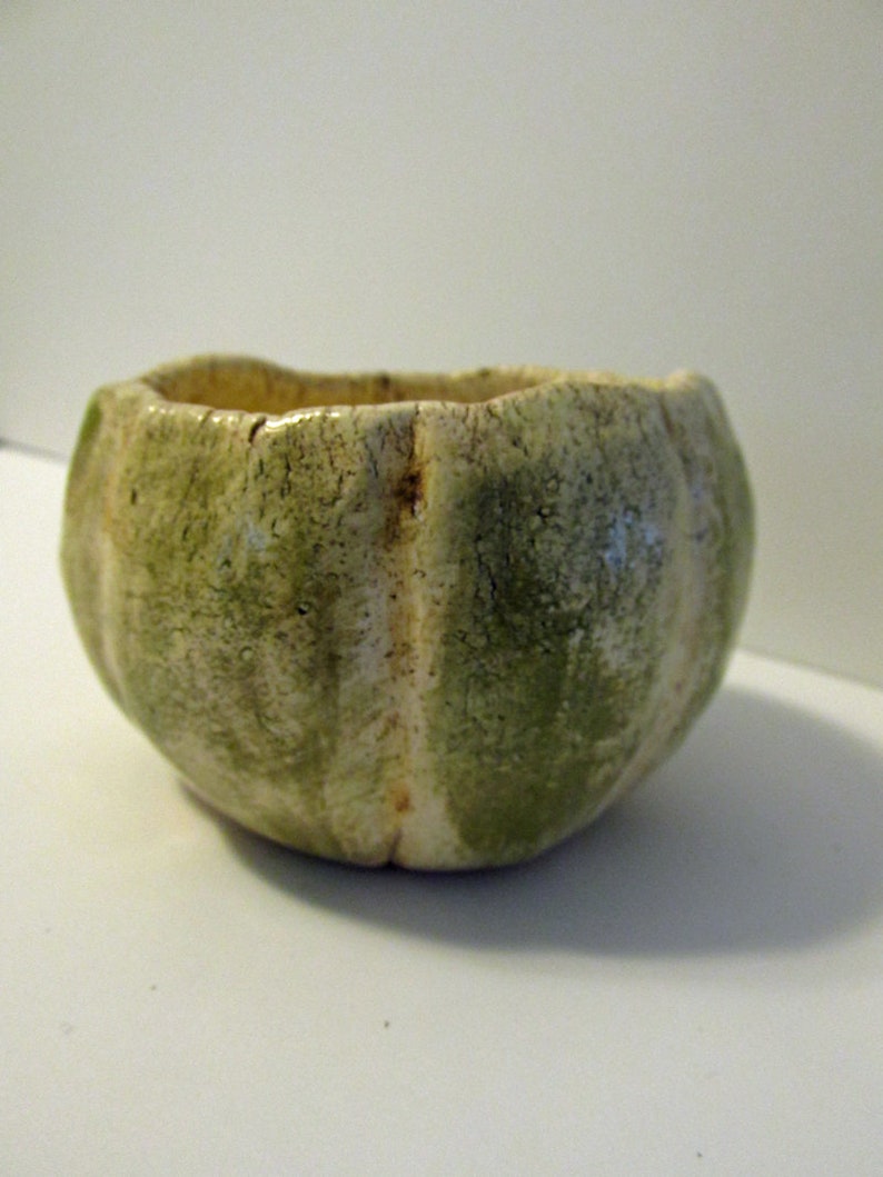 Small ceramic fired pumpkin style trinket bowl