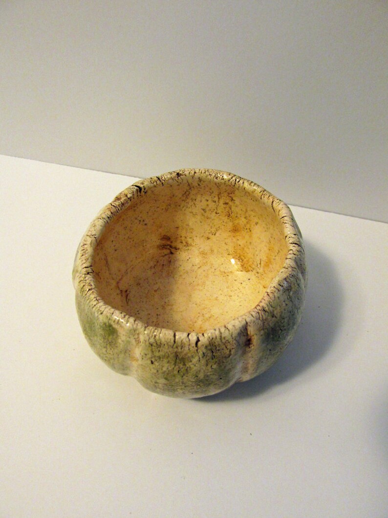 Small ceramic fired pumpkin style trinket bowl