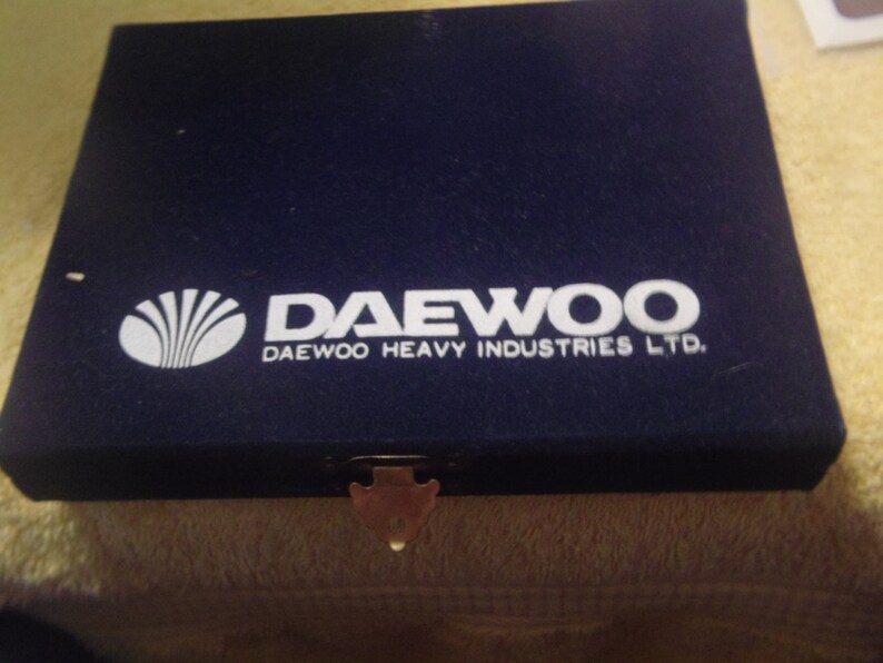 Vintage Daewoo Heavy Industries Gold Tone Collectible Spoon Set