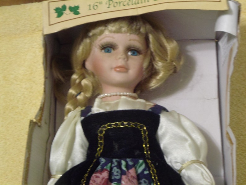 the heirloom collection porcelain dolls