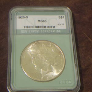 NTC MS63 1925 S Silver Peace Dollar