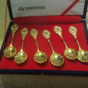 Vintage Daewoo Heavy Industries Gold Tone Collectible Spoon Set