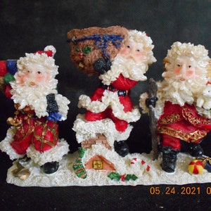 Three Santa&#39;s - Taper Candle Holder