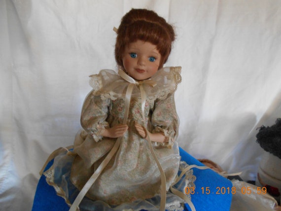 praying porcelain doll