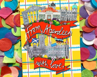 May include: A yellow and blue plaid card with a red banner that says "From Aberdeen with love". The card features a hand-drawn illustration of buildings and landmarks in Aberdeen, Scotland.