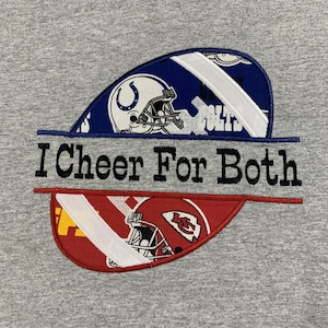 May include: A gray sweatshirt with an embroidered design of two football helmets, one blue and one red, with the text "I Cheer For Both" in black.