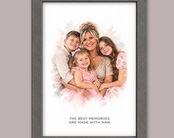 May include: A framed watercolor-style portrait of a woman and three children, with the text "THE BEST MEMORIES ARE MADE WITH NAN" printed at the bottom. The artwork features soft, blended colors and is enclosed in a dark gray wooden frame.
