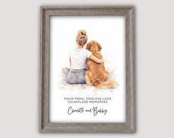 May include: A framed watercolor print featuring a person with blonde hair in a bun sitting next to a golden retriever dog. The text reads: FOUR PAWS, ENDLESS LOVE COUNTLESS MEMORIES, Charlotte and Bobby. The frame is a textured light brown wood.