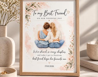 May include: A framed print featuring an illustration of two people sitting back-to-back with arms around each other. Text reads: To my Best Friend ON HER WEDDING DAY. We've shared so many chapters, and today I get to watch my best friend begin her favourite one. 17.02.2026.