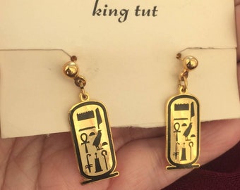 NOS 1970s Egyptian Revival hieroglyphics Earrings vintage Gold tone enamel dangle small pierced statement Runway figural King Tut Rare!