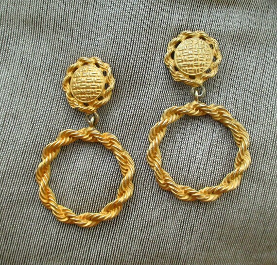 tear drop shape clip on earrings Runway vintage 80s Made by Essex. sculptured gold tone metal satin russian massive