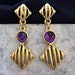 see more listings in the CLIP ON EARRINGS section