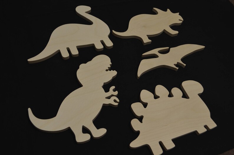 painted wood dinosaur cut outs