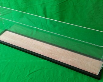 44"L x 8"W x 13"H display case with 3/16" thick acrylic black wood frame base