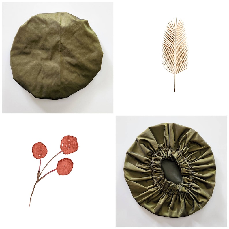May include: Two olive green shower caps, one with a gathered edge and one with a smooth edge. A watercolor painting of a red berry branch with three berries.