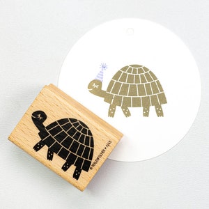 Timbre | tortue qui court
