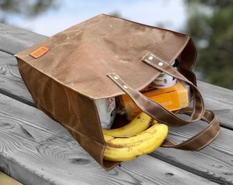 Heavy Duty Grocery Tote. A Reusable Shopping Bag with Handles. Folds Flat. Eco friendly Waxed Canvas resists water and stains. Made in USA