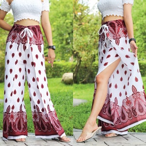 Combinaison pantalon évasé slim sexy rayé à imprimé licou pour femme Combinaison pantalon évasé slim sexy rayé à imprimé licou pour femme