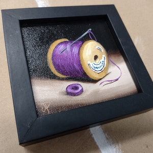 Little Needle and thread Purple cotton reel Original still life Oil Painting, by Jane Palmer Art Framed contemporary Realism artwork black framed