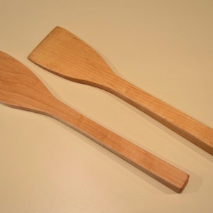 Two handmade maple spatulas about 10 1/2 inches long