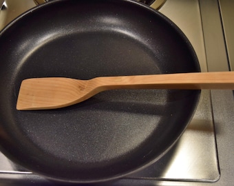 Handmade maple spatula about 10 1/2 inches long, 1 3/4 inches wide
