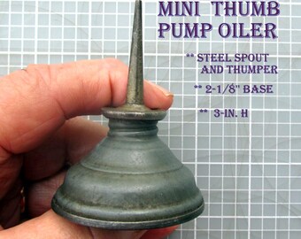 Mini Thumb Pump Oiler  Unbranded  3-in. H  2-1/8''Base  Conical Metal Body