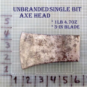 May include: An unbranded single bit axe head with a 3-inch blade. The axe head weighs 1lb 4.7oz and has a weathered, metallic appearance. Text on the image reads "UNBRANDED SINGLE BIT AXE HEAD".
