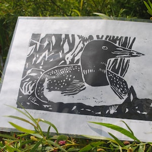 Common Loon by lake linoleum block print