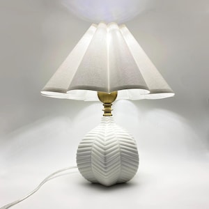 Handmade White Ceramic Table Lamp: Carambola Shape, Beige Fabric Shade