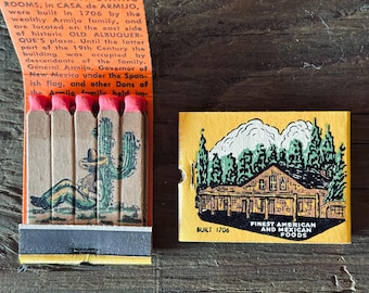 May include: Two vintage matchbooks. One is orange with text about the Hacienda Dining Rooms, and matches with red tips. The other is yellow with a drawing of a building and the text "Finest American and Mexican Foods".