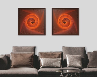 May include: Two square framed abstract art prints with a swirling orange and brown design. The prints are hanging on a white wall above a brown sofa with cushions.