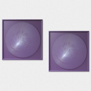 May include: Two framed wall art pieces with a purple background and a white circular design in the centre. The design is made up of thin lines radiating outwards from the centre.