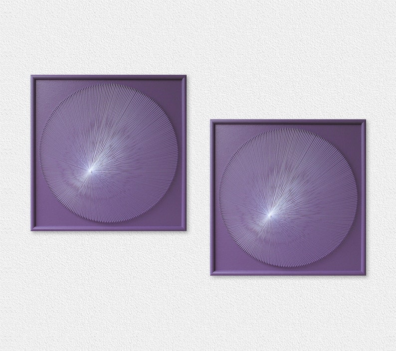 May include: Two framed wall art pieces with a purple background and a white circular design in the centre. The design is made up of thin lines radiating outwards from the centre.