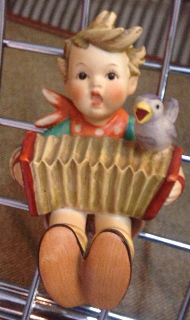 hummel boy with accordion and bird